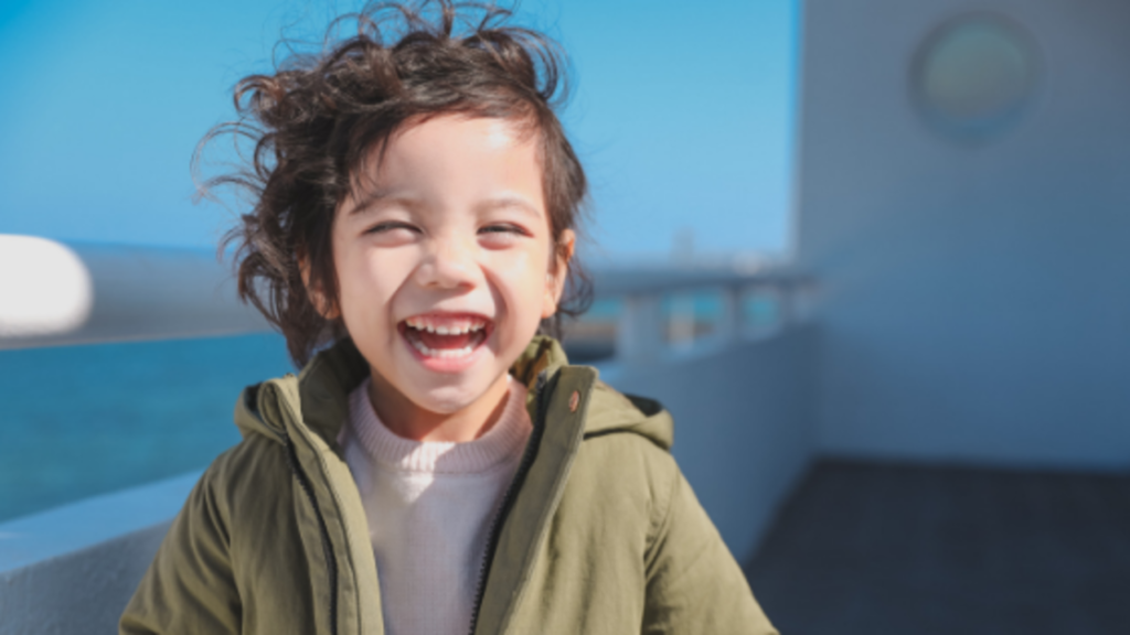 why is my toddler laughing for no reason